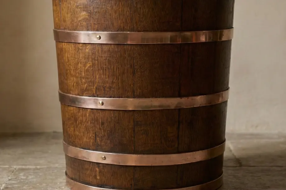 Coopered oak bucket with copper bands
